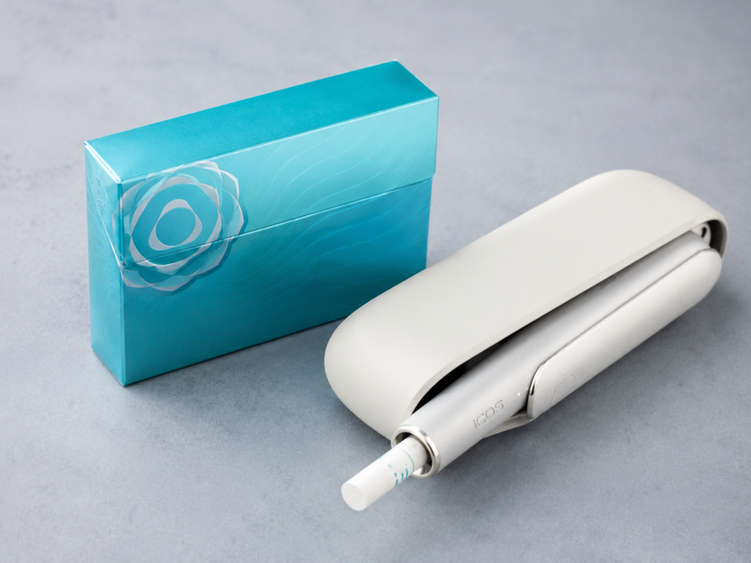 Terea Turquoise Swiss with IQOS ILUMA device in Dubai UAE, compatible gentle menthol tobacco stick
